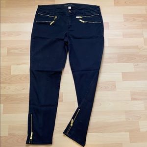 Black Michael Kors jeans with gold hardware